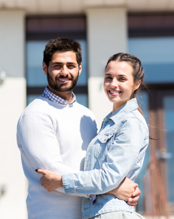 couple-by-new-house-2025-03-13-10-08-23-utc